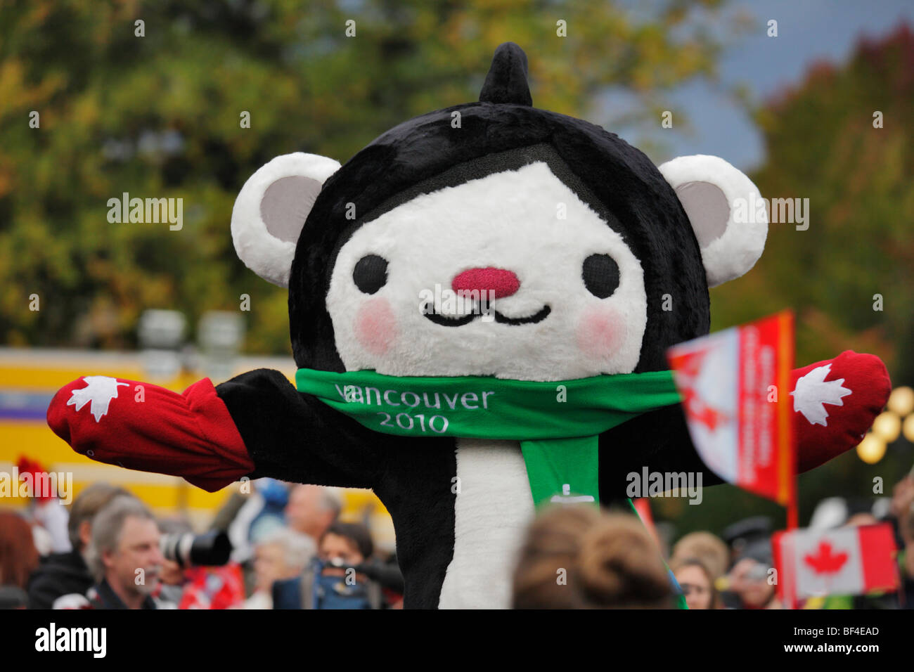 2010 Winter Olympic mascot performing in front of crowd during Olympic Flame arrival-Victoria, British Columbia, Canada. Stock Photo