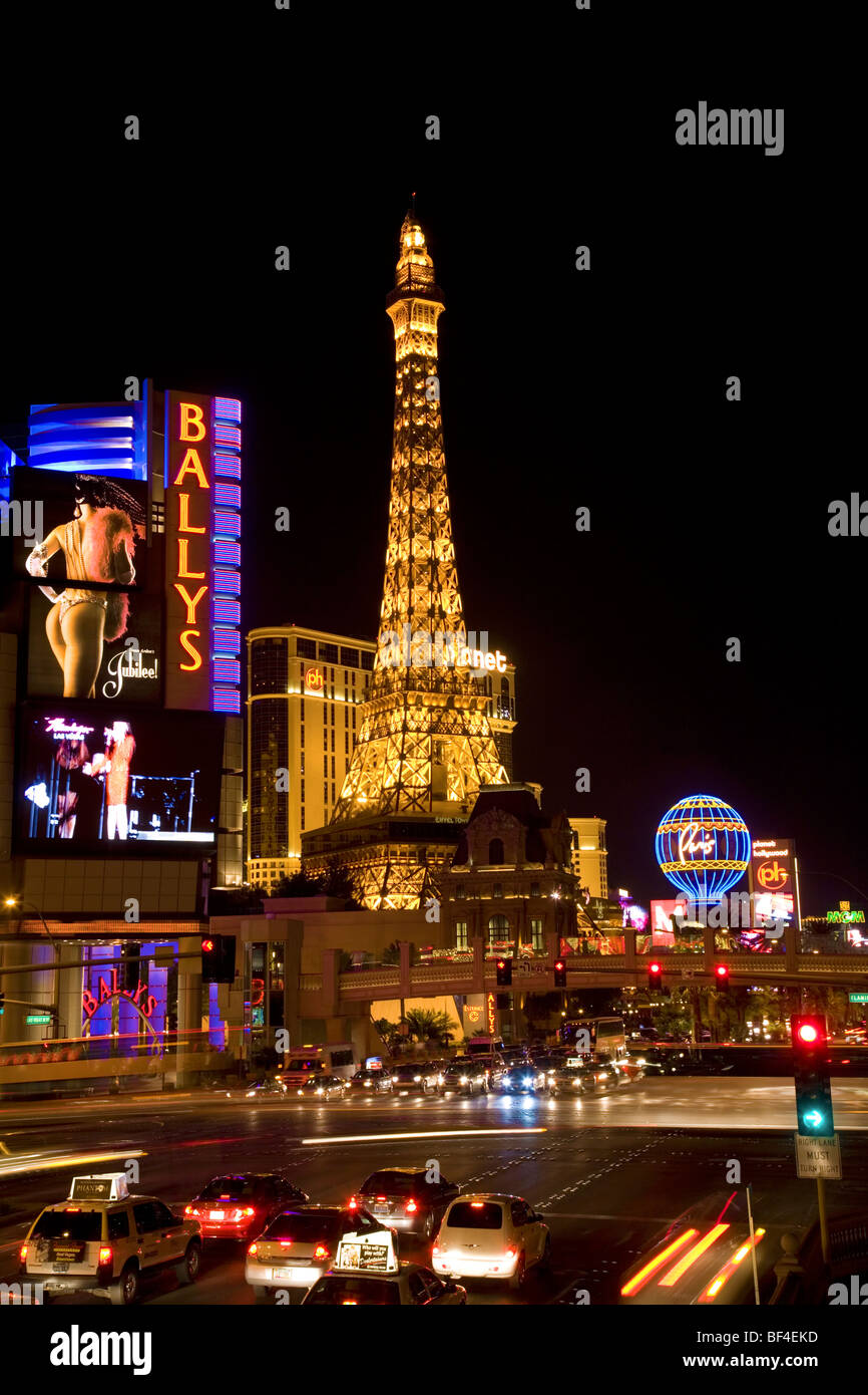 The Strip at night with Ballys casino and Paris Hotel with replica Eiffel Tower and balloon Las Vegas Stock Photo Alamy