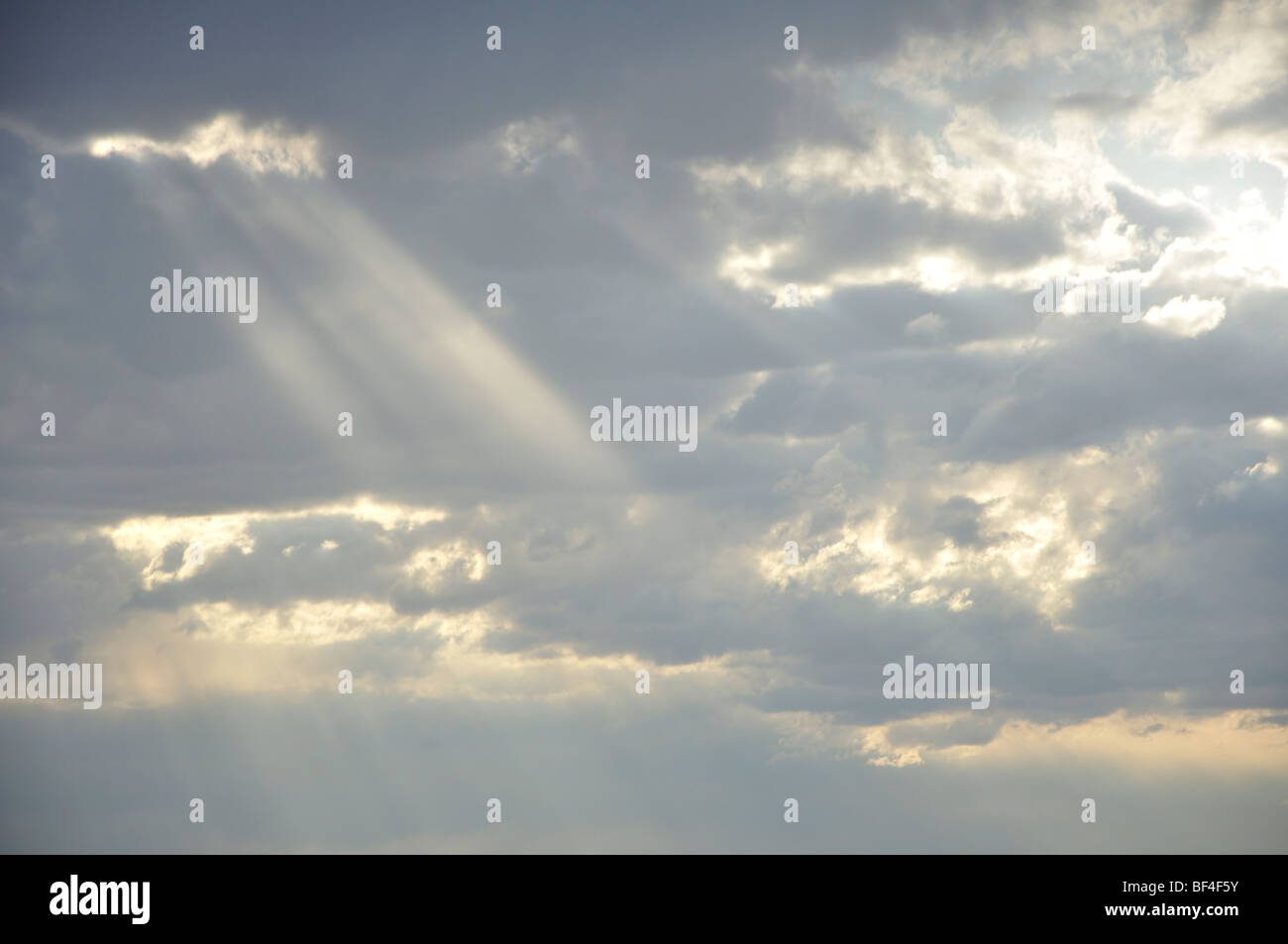Sunray through clouds hi-res stock photography and images - Alamy