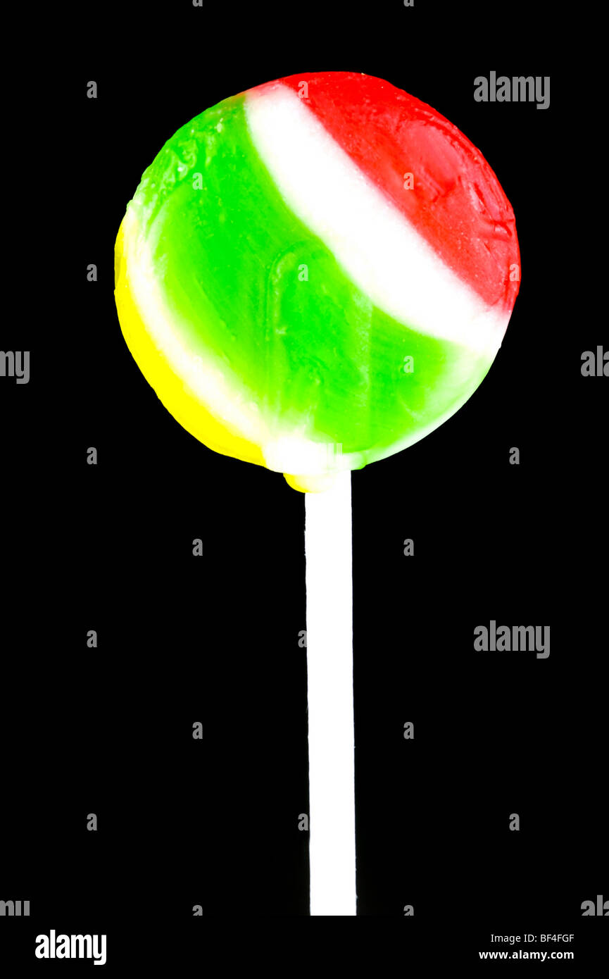 Lolly pops isolated against a black background Stock Photo