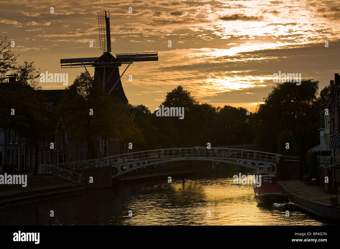 Windmill and bridge in Dokkum, Friesland, Holland, Netherlands, Europe Stock Photo