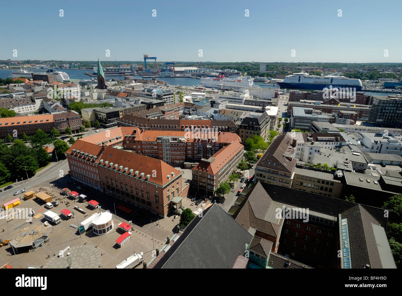 View over the city of Kiel towards the inner fjord with a docked cruise ship and the ferries of the Stena Line for Swedish conn Stock Photo