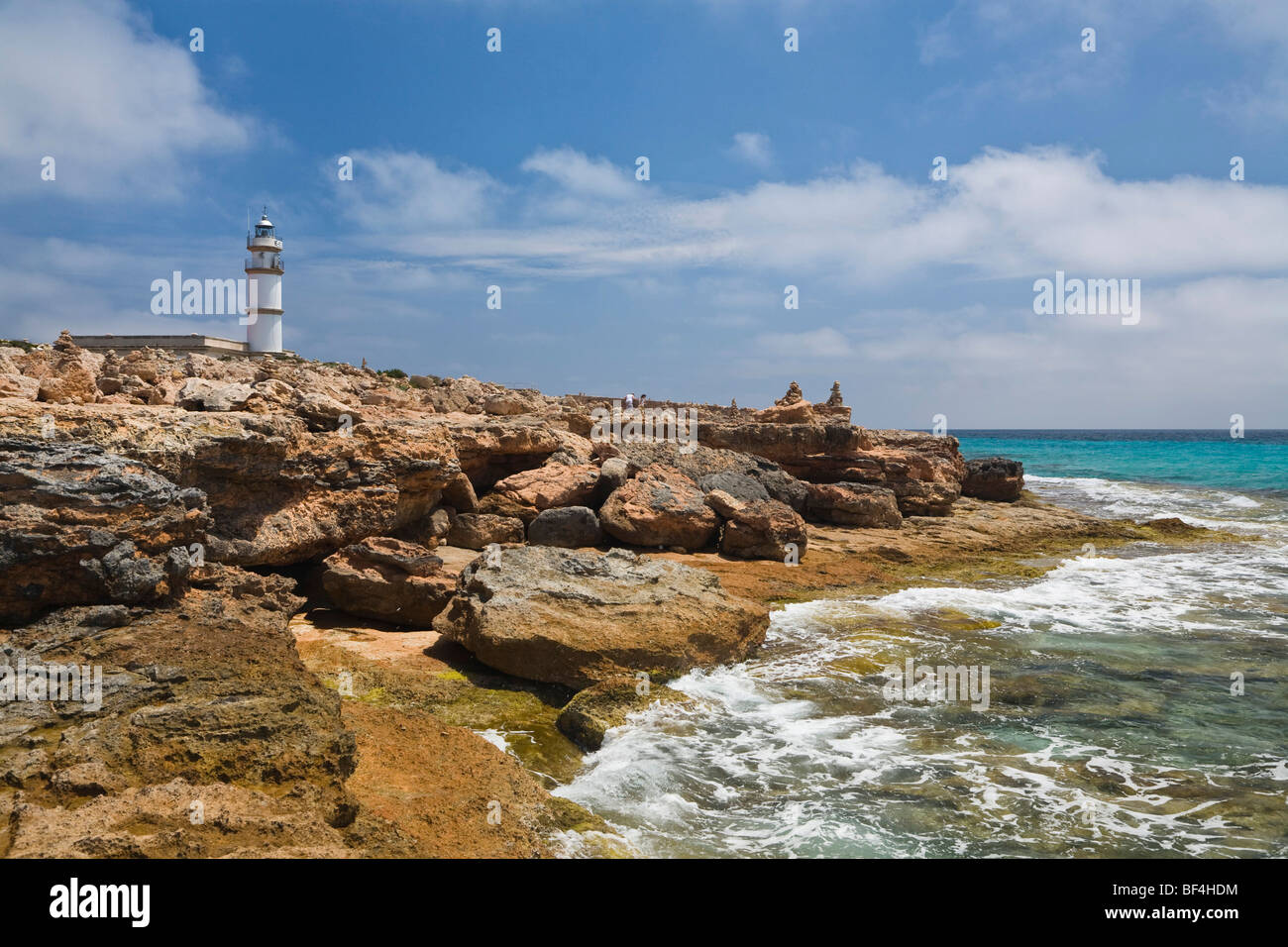 Lighthouse at the cape Cap de ses Salines, Mallorca, Majorca, Balearic Islands, Mediterranean Sea, Spain, Europe Stock Photo