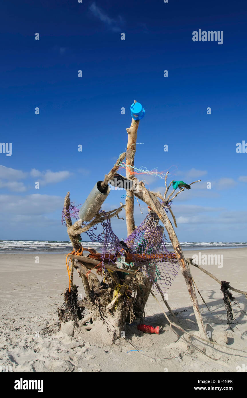 Artwork from flotsam on the North Sea beach, Vejer beach, Jutland, Denmark, Europe Stock Photo