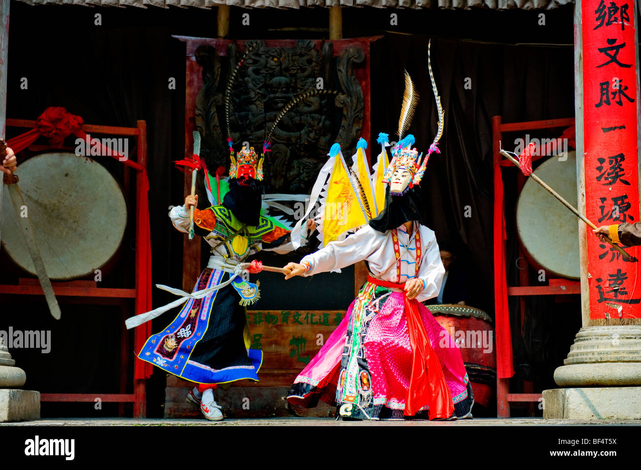 Men performing Dixi, Tianlongtunbao, Anshun County, Guizhou Province, China Stock Photo