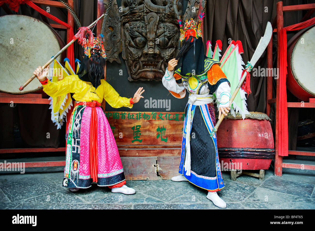 Men performing Dixi, Tianlongtunbao, Anshun County, Guizhou Province, China Stock Photo