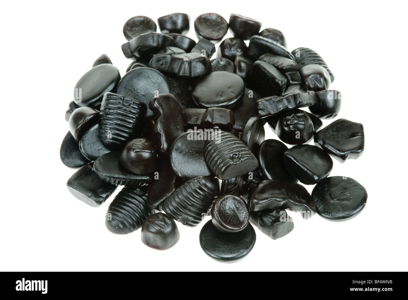 typical dutch liquorice candy isolated on a white background Stock