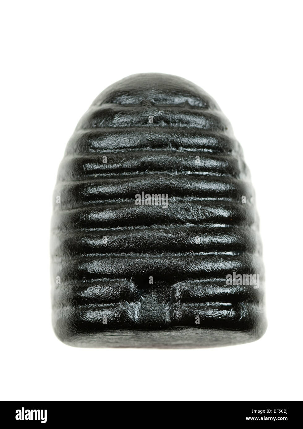 typical dutch honey liquorice candy isolated on a white background