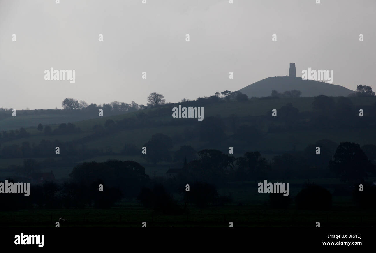 a landscape Glastonbury tor on a grey overcast day Stock Photo Alamy