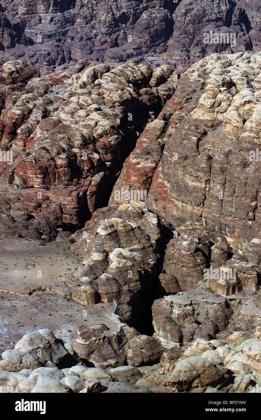 The first sighting of an entrance to Petra, across the mountains of southern Jordan. Stock Photo