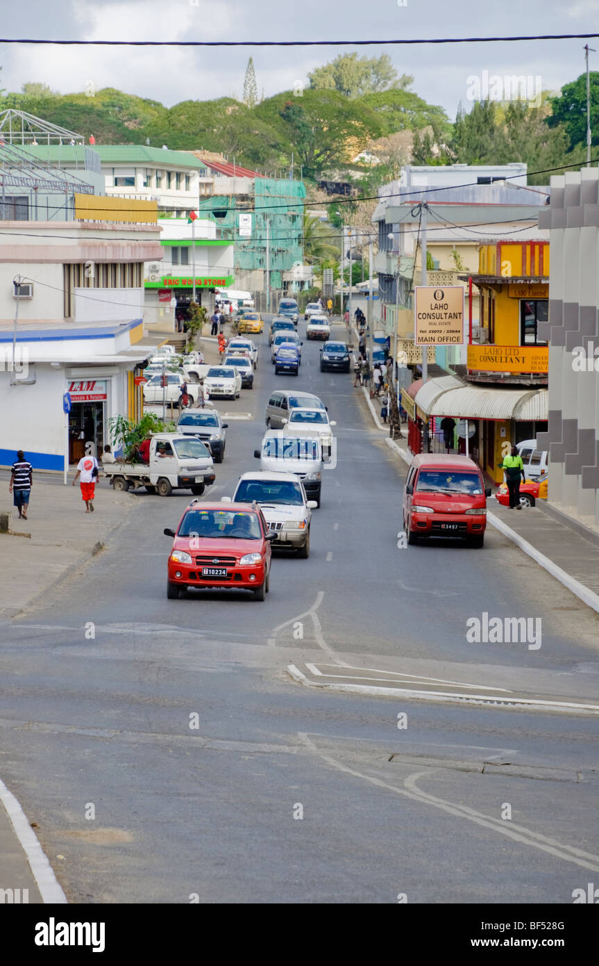Busy traffic on a street in the centre of a small South Pacific island capital. Stock Photo