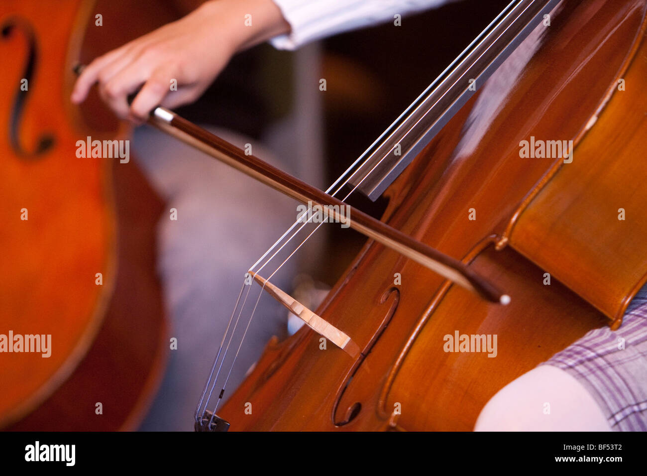 Child playing the cello Stock Photo