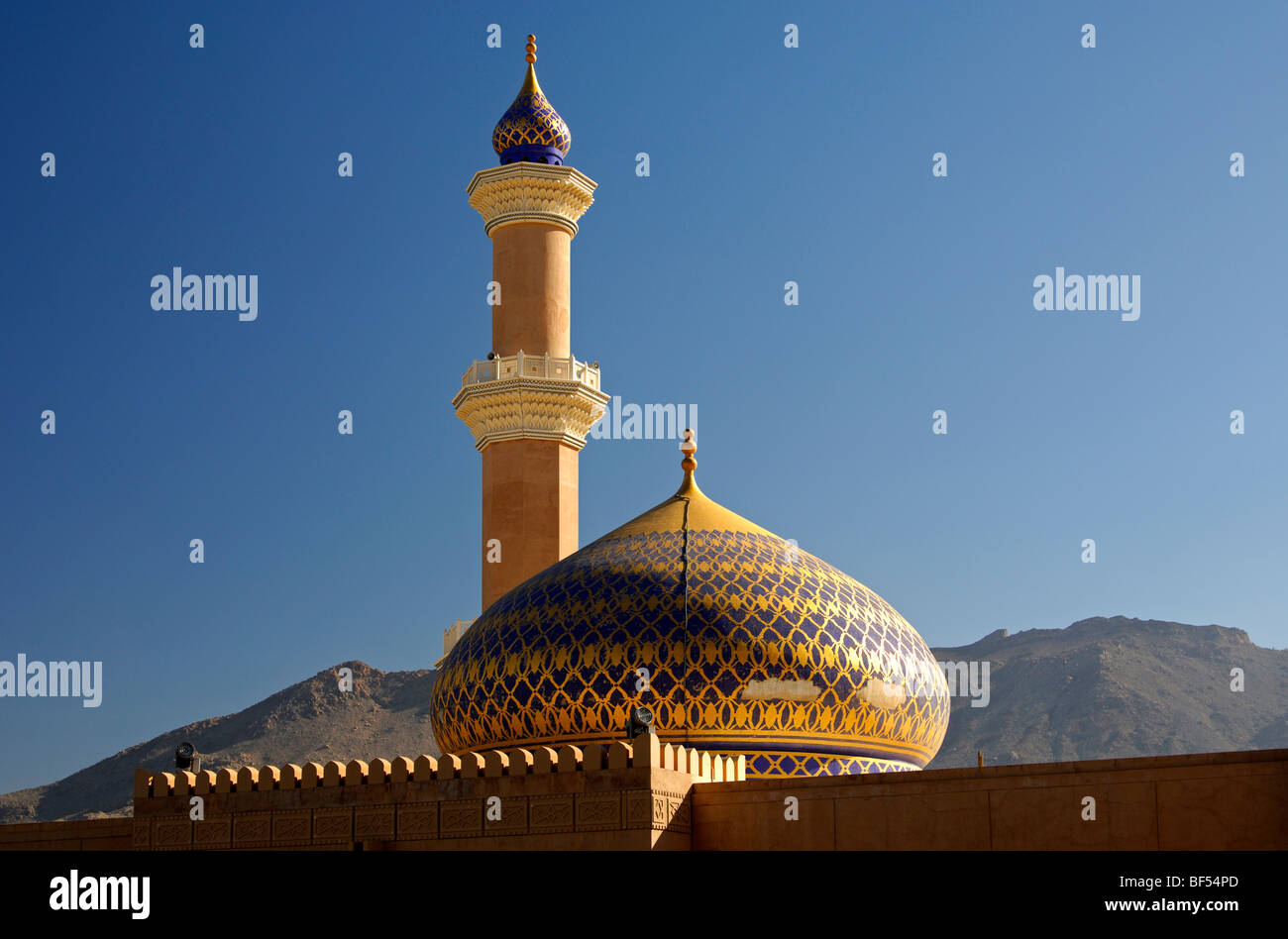 Minaret and dome of the Great Mosque in Nizwa, Sultanate of Oman, Middle East Stock Photo