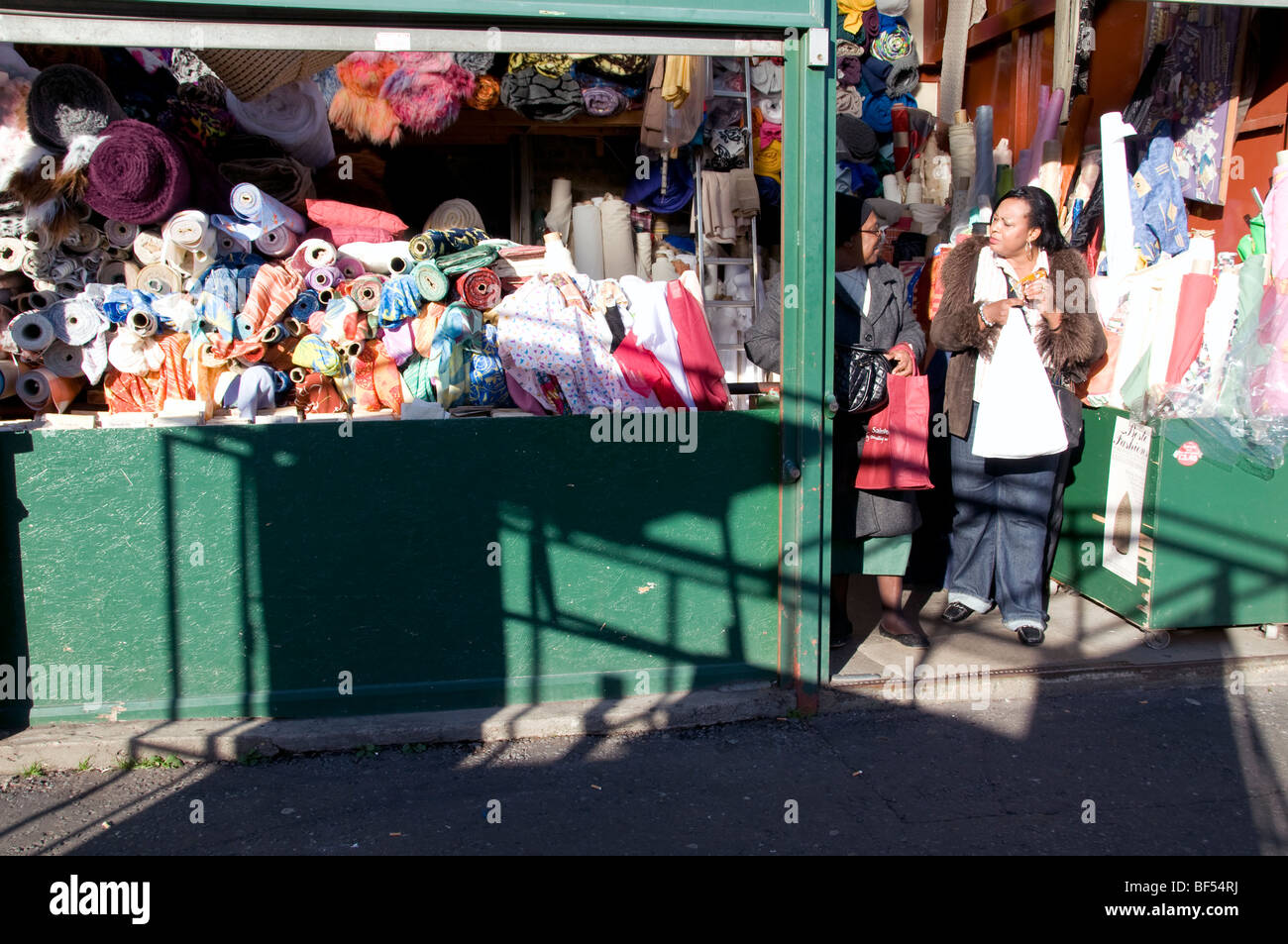 UK.Afro Caribbean textile and cloth shop in Ridley Rd. market,Hackney London Photo Julio Etchart Stock Photo
