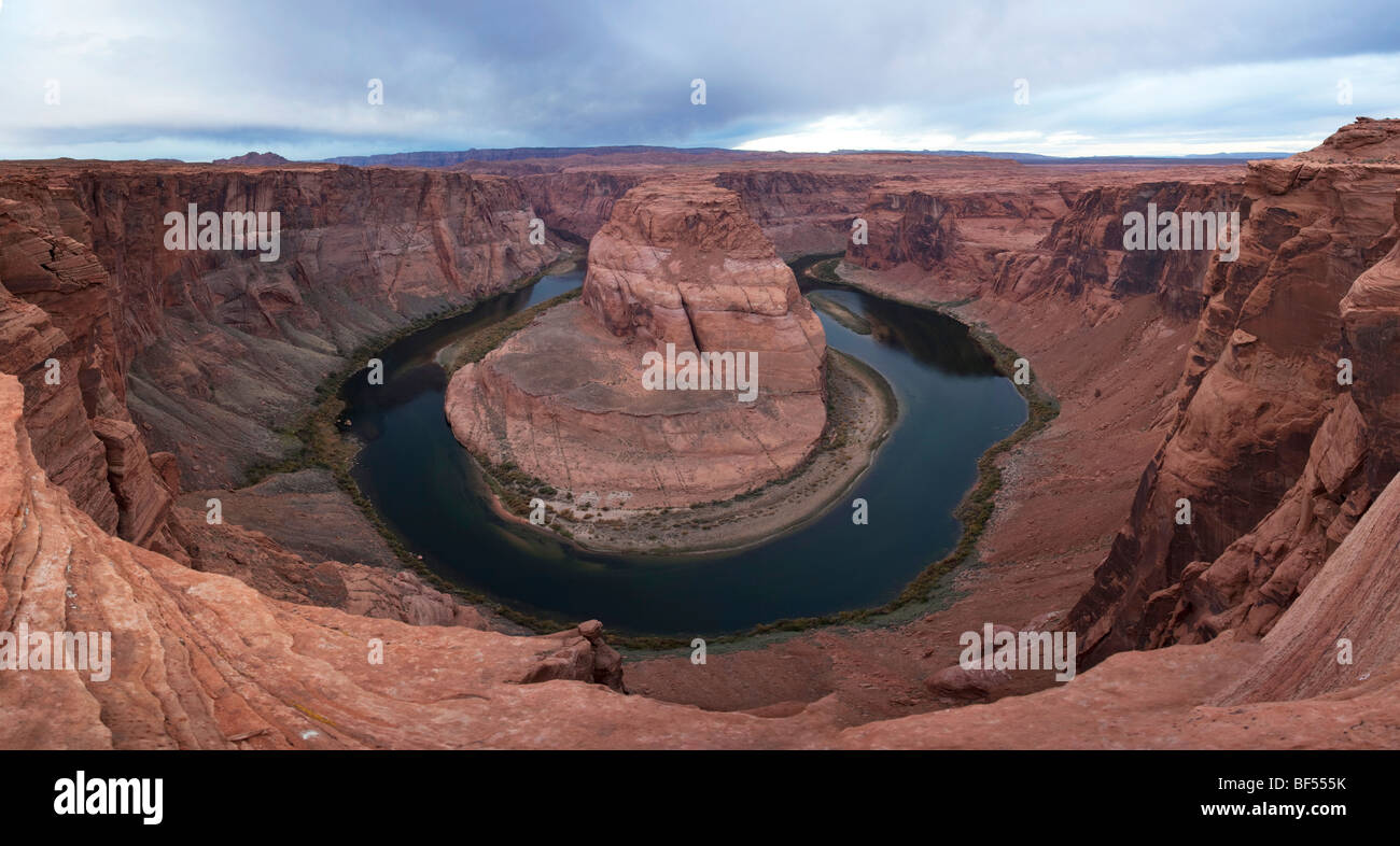 Horseshoe bend seen from the lookout point at sunrise, Colorado river, Page, Arizona, USA Stock