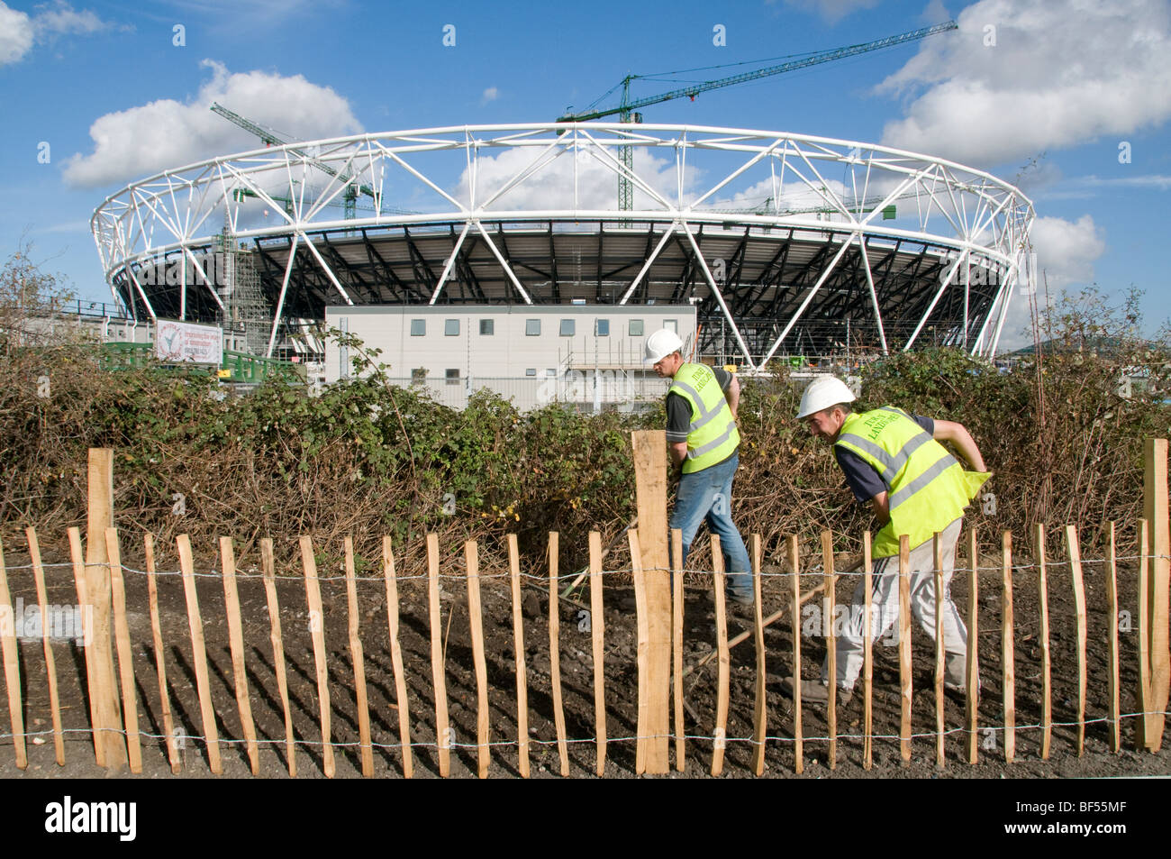 UK Landscape gardeners by stadium at Olympic Park construction in progress in east London Photo © Julio Etchart Stock Photo