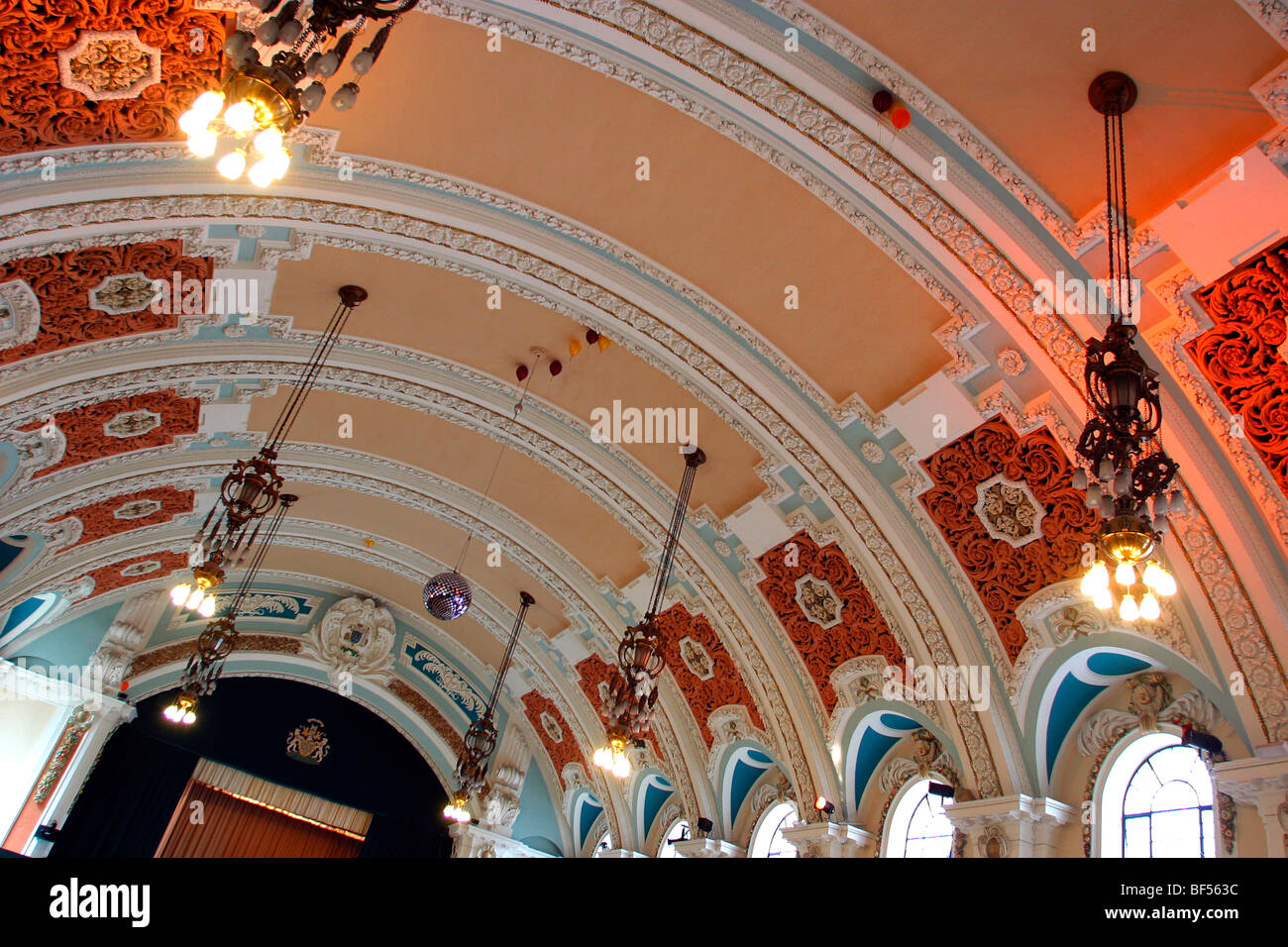 England, Cheshire, Stockport, Town Hall, ballroom ceiling of decoratively painted plasterwork Stock Photo