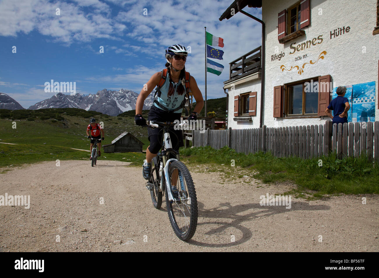 Mountain bike riders at the Senes mountain lodge, Naturpark Fanes-Sennes-Prags, Trentino, South Tyrol, Italy, Europe Stock Photo