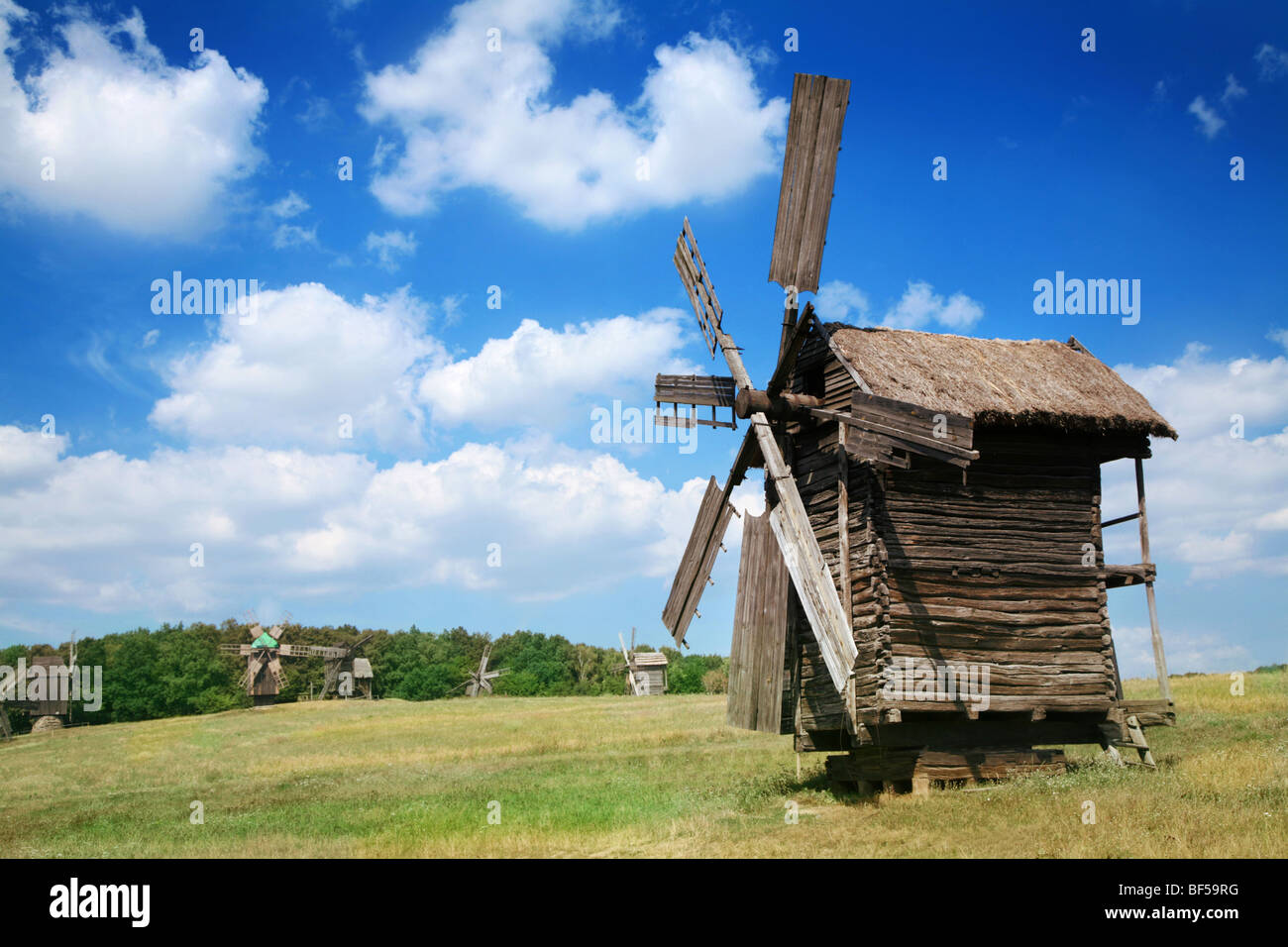Old windmills in the summer countryside Stock Photo