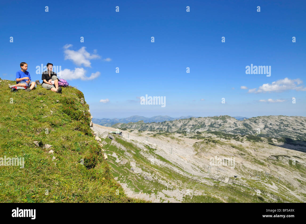 Pause on the way to the summit of the Hoher Ifen Mountain, Vorarlberg, Allgaeu Alps, Austria, Europe Stock Photo