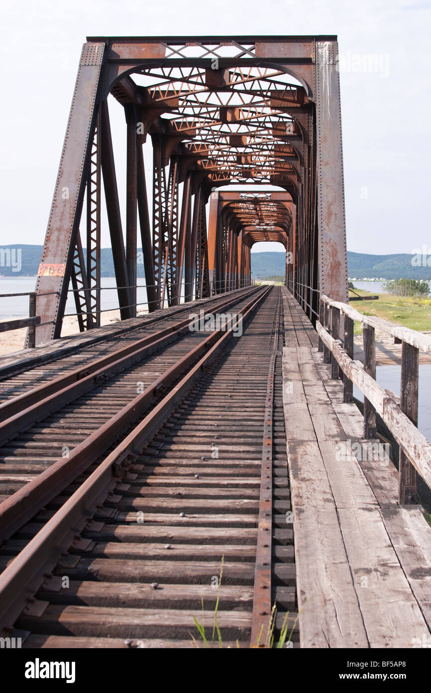 Iron and wooden railroad trestle bridge in Quebec, Canada. Stock Photo