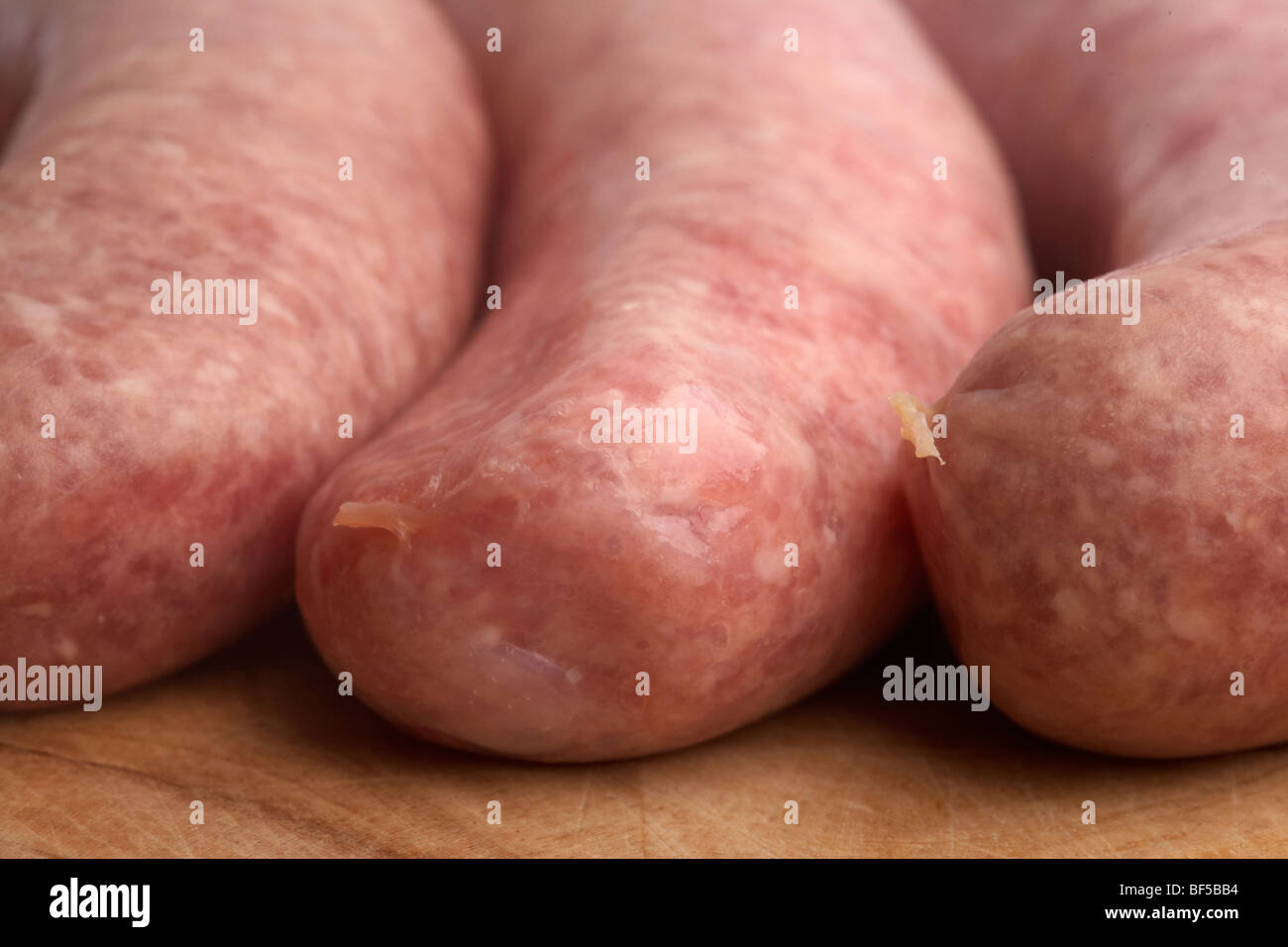 raw links of pork sausage from organic british saddleback pigs reared in ireland Stock Photo