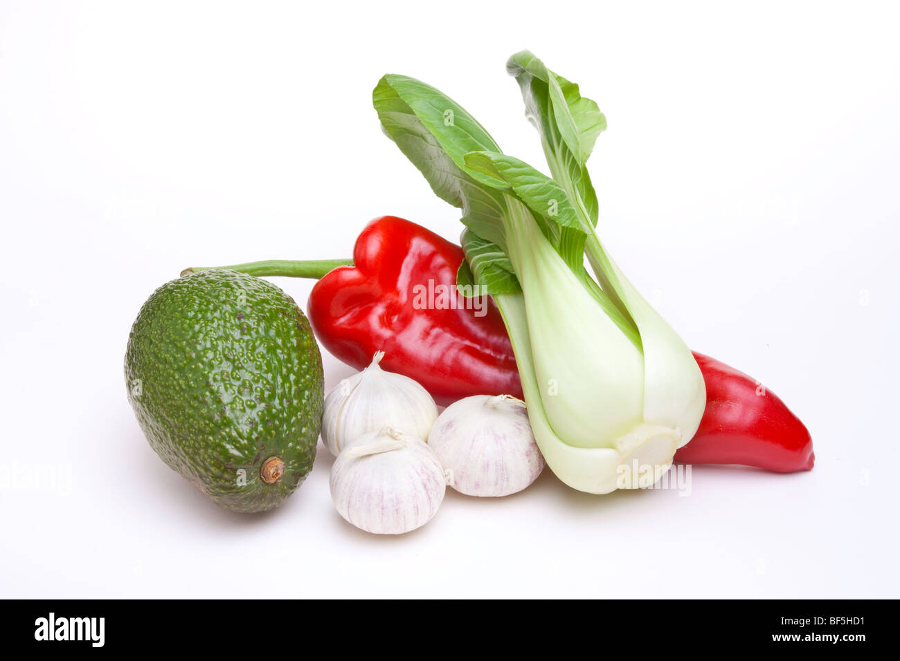 A selection of exotic multicoloured Fruit and Vegetables isolated against white background. Stock Photo