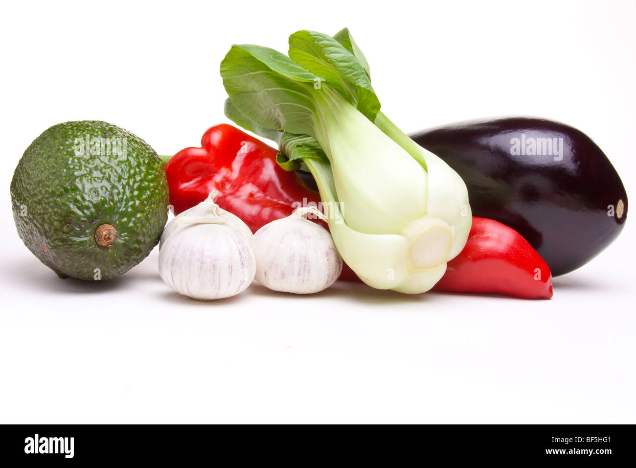 A selection of exotic multicoloured Fruit and Vegetables isolated against white background. Stock Photo