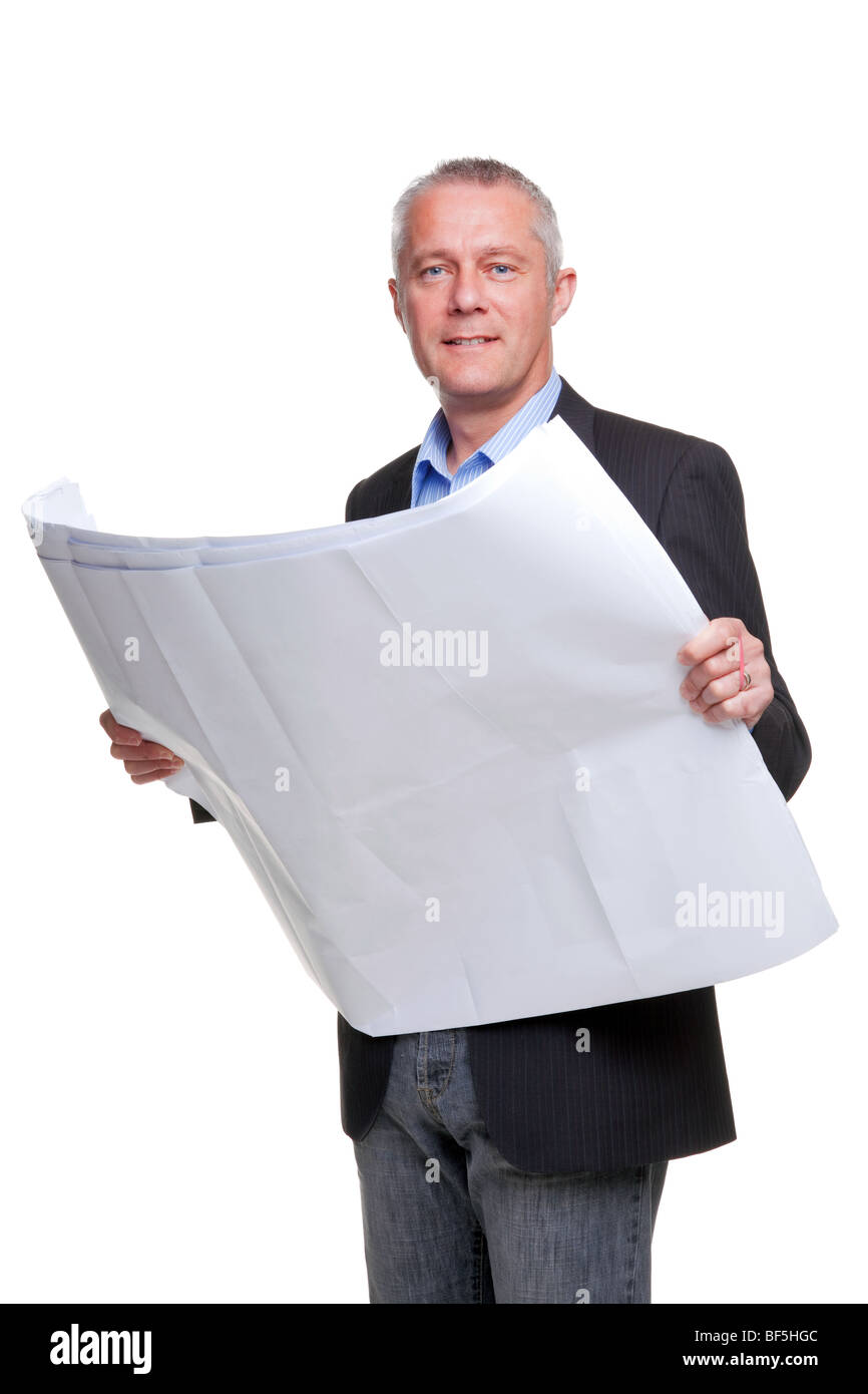 Male architect holding a set of building plans, isolated on a white background. Stock Photo