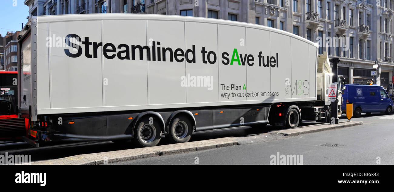 Marks and Spencer supply chain store delivery lorry truck streamlined aerodynamic M&S trailer shape to save fuel wait at Oxford Circus junction London Stock Photo