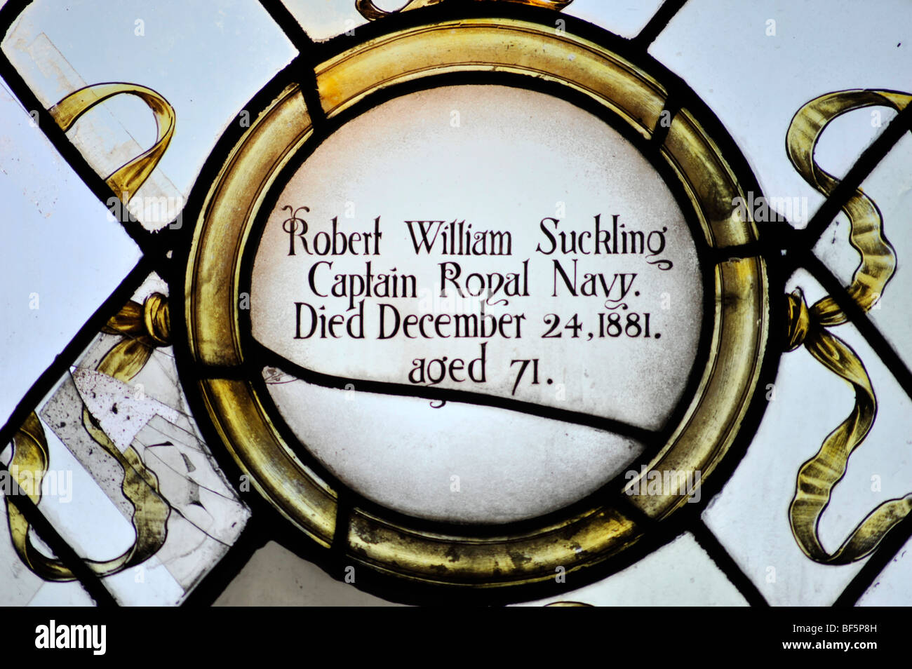 stain glass window commemorating robert william suckling in barsham church suffolk england Stock Photo