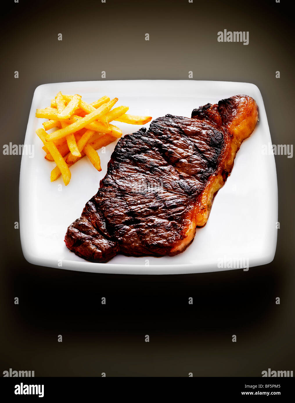Steak and chips. Stock Photo