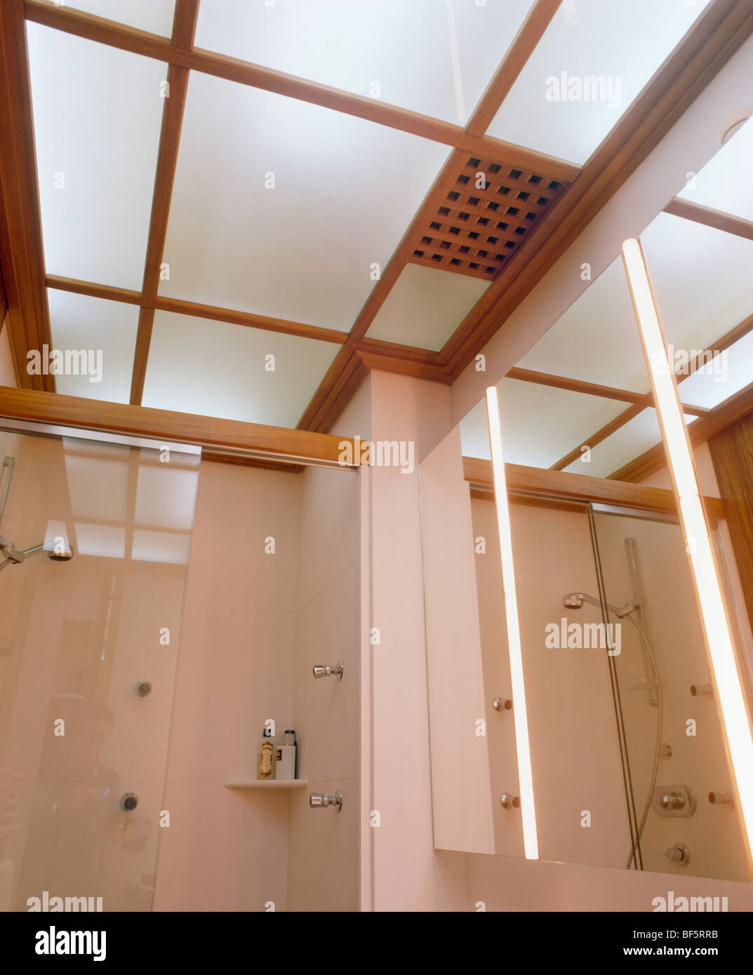 Looking Up At Opaque Glass Panels In Ceiling In Modern Cream