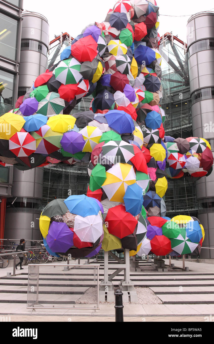 Channel 4 Four TV studios in Horseferry Road Westminster London with umbrella art artwork in the shape of 4 four logo Stock Photo