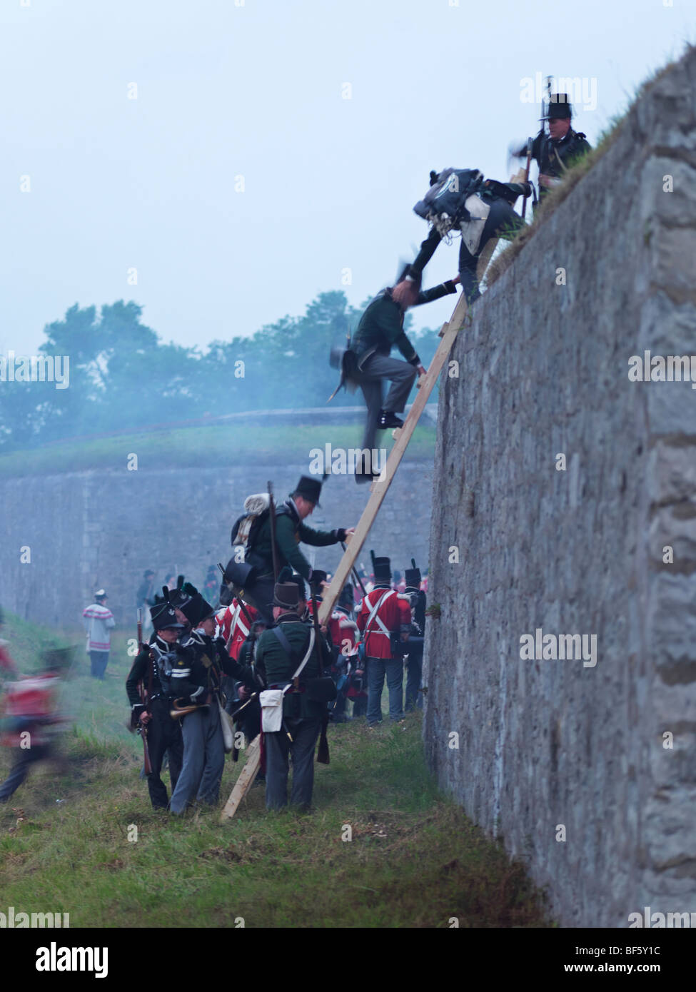 Canada, Ontario, Fort Erie, Old Fort Erie, War of 1812 reenactors in period costume. American soldiers breaching the British for Stock Photo
