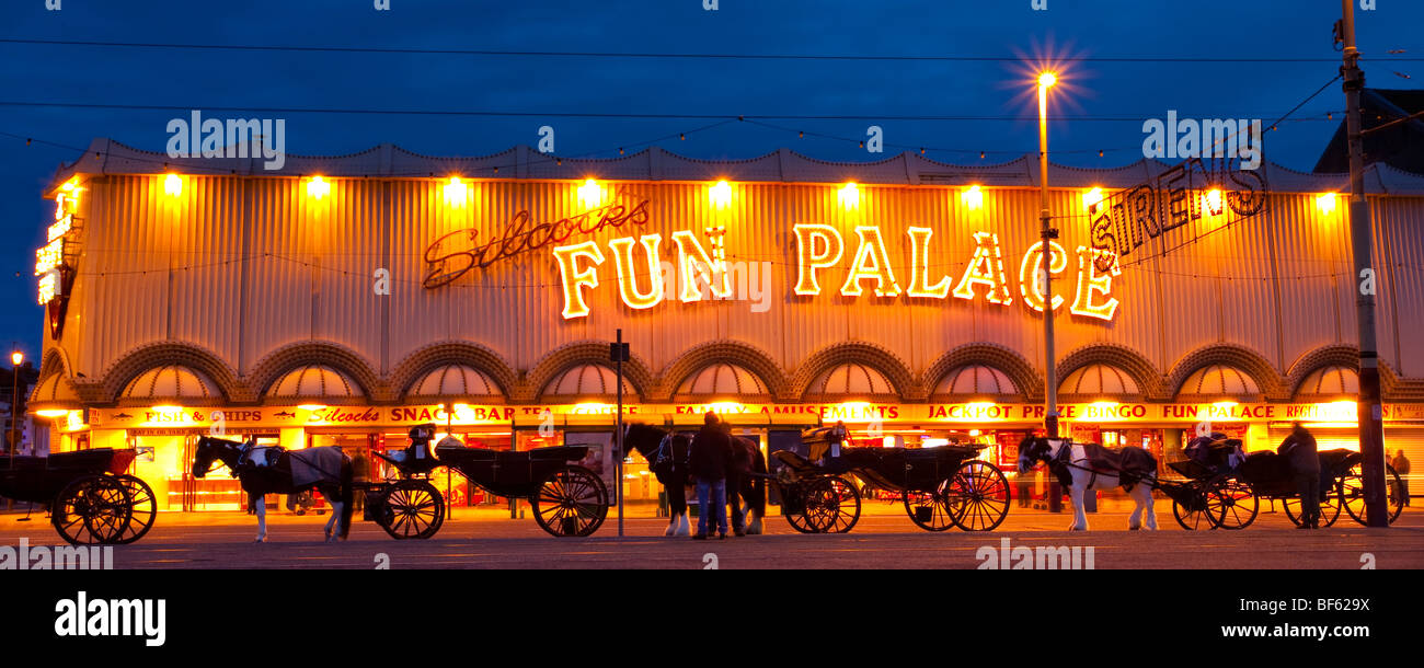 England, Lancashire, Blackpool. Hackney Carriages outside the Fun Palace amusement arcade on the Golden Mile. Stock Photo