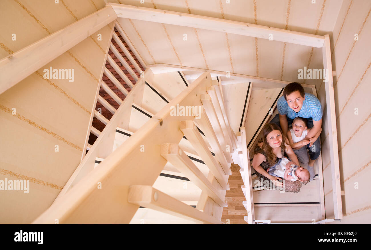Young family of four hi-res stock photography and images - Alamy