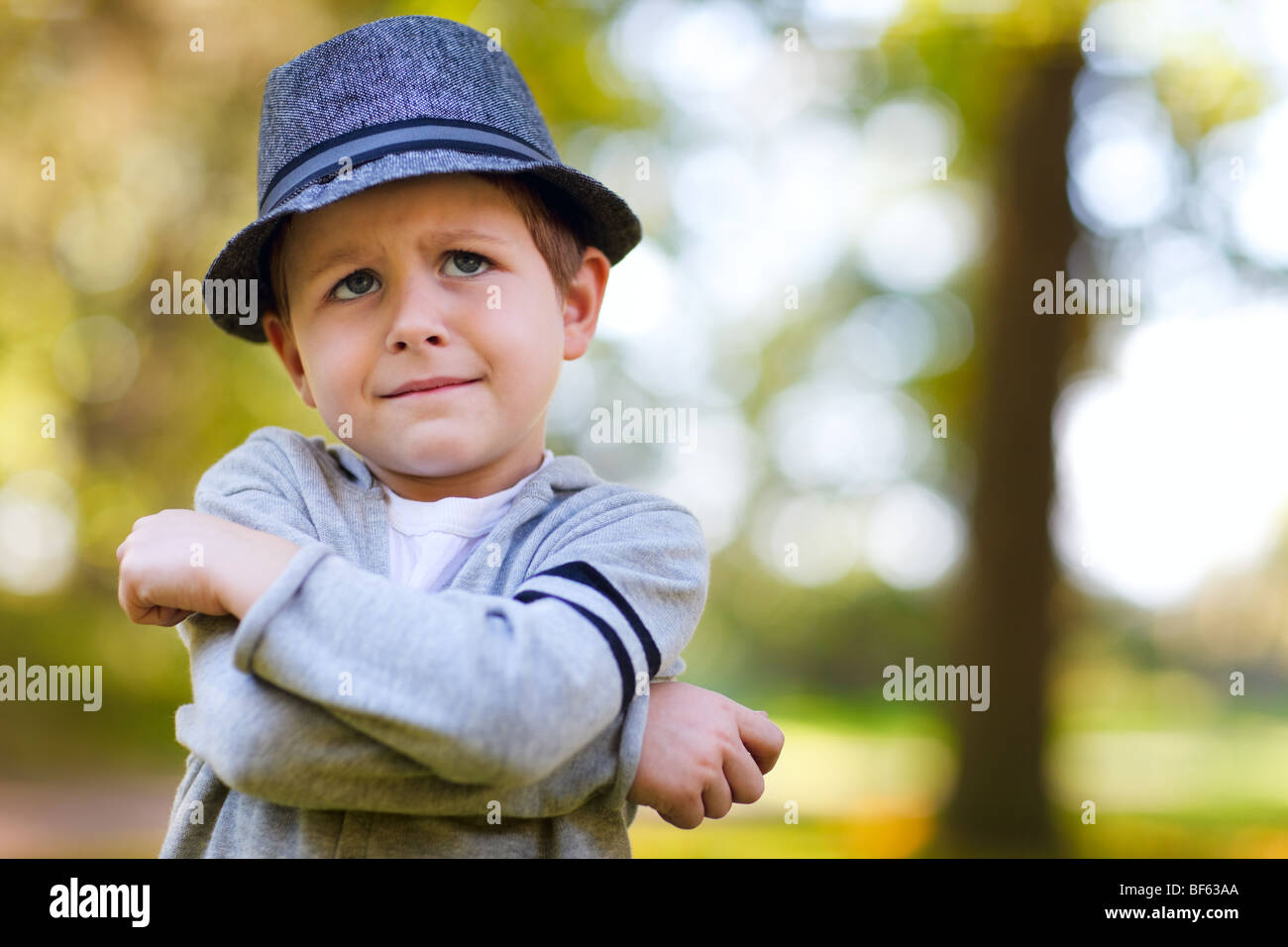 Stylish young 4 year old angry boy Stock Photo