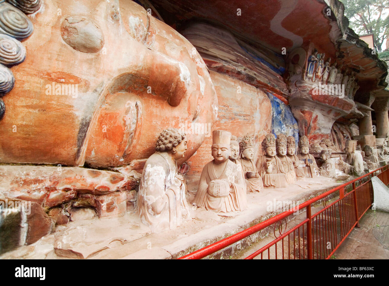 Exquisite detailed carving of disciples of Buddha and the Reclining ...