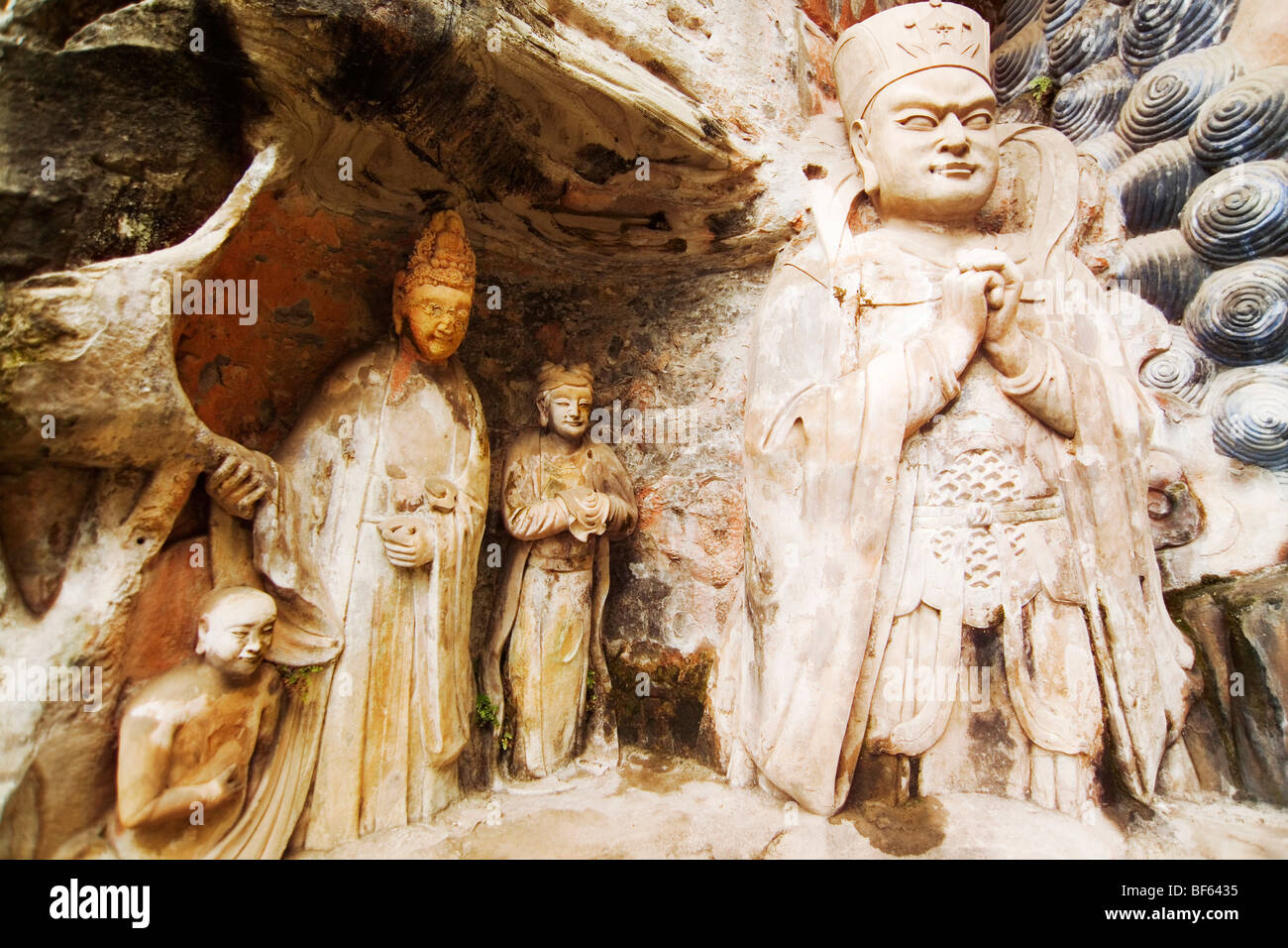 Exquisite detailed carving of Buddha's disciples, Dazu Grotto, Baoding ...
