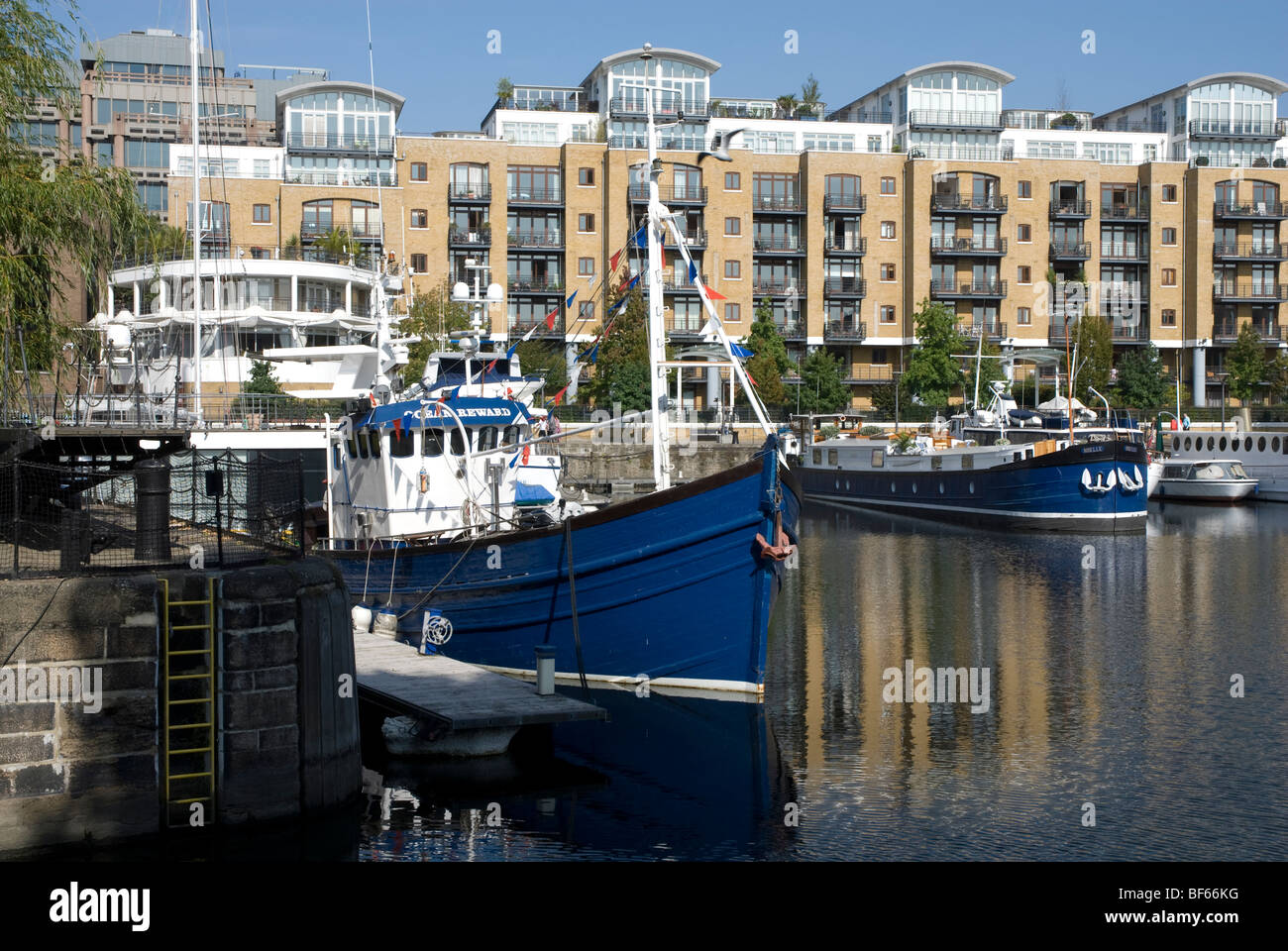 Boats in the marina at St Katharines Dock London E1 Stock Photo