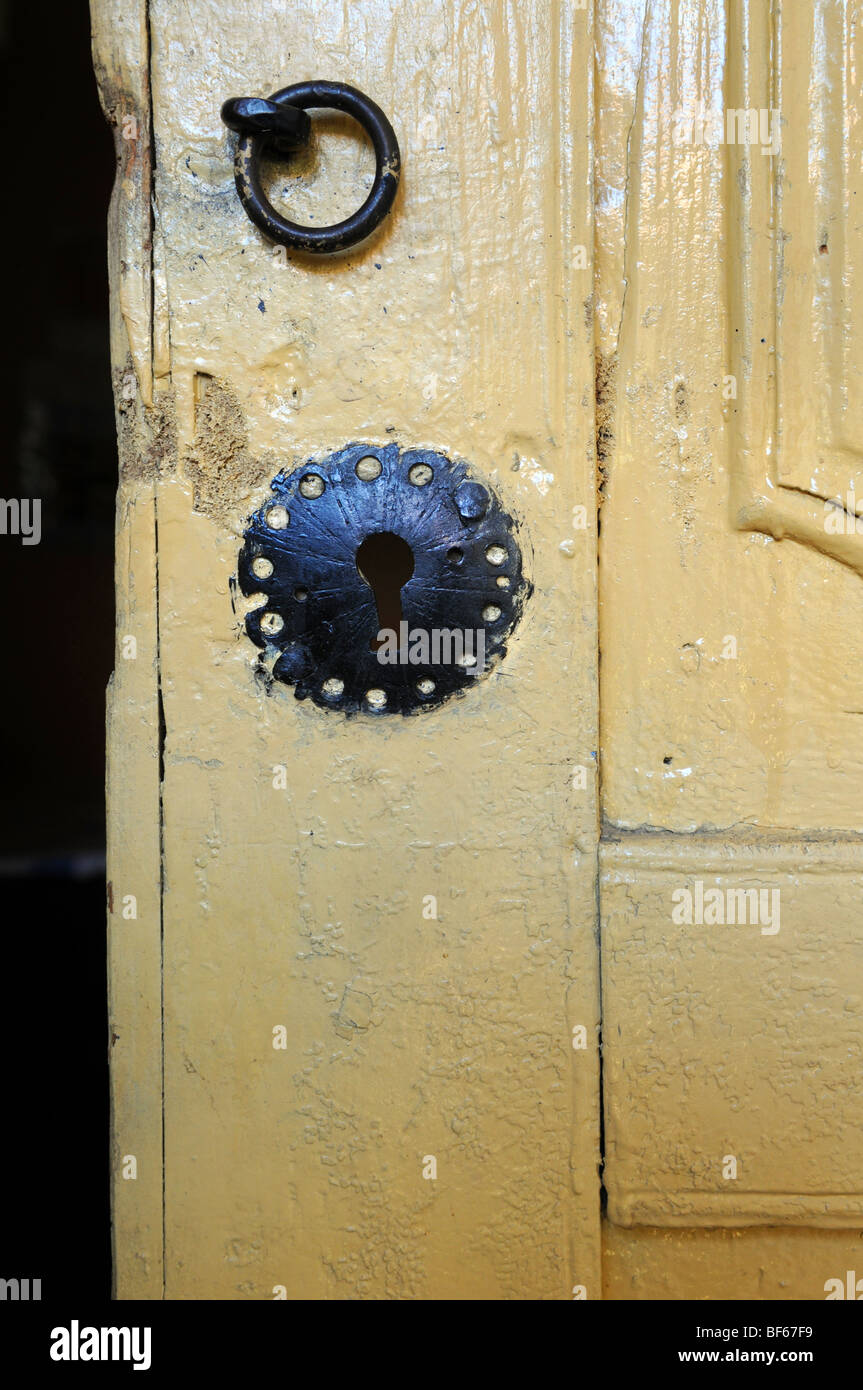 Grunge old door with lock and handle Stock Photo