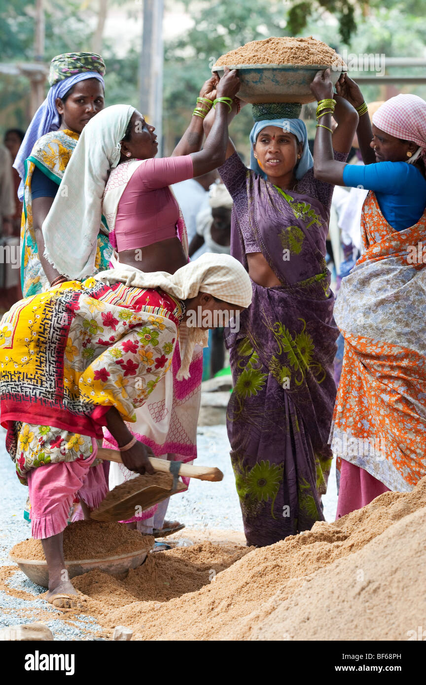 Road construction gang workers making hires stock photography and