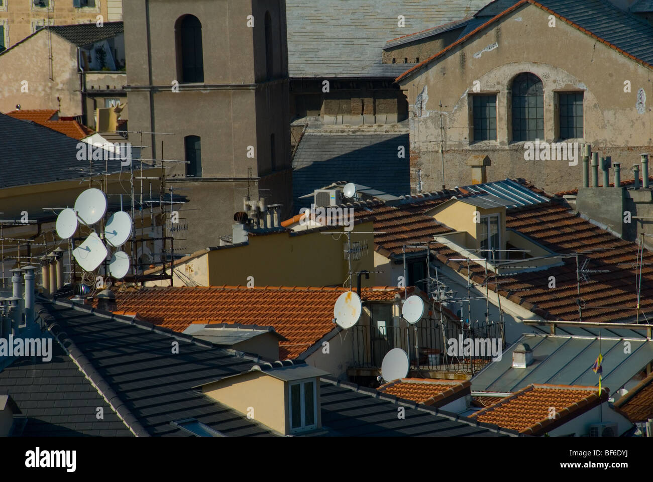 Rooftops across the northern Italian town of Savona showing Satellite Dishes and TV aerial Stock Photo