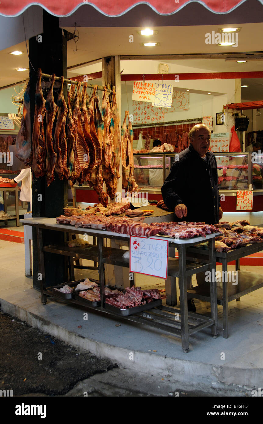 Butchers shop showing uncovered meat on sale in this Greek market in central Thessaloniki Greece Stock Photo