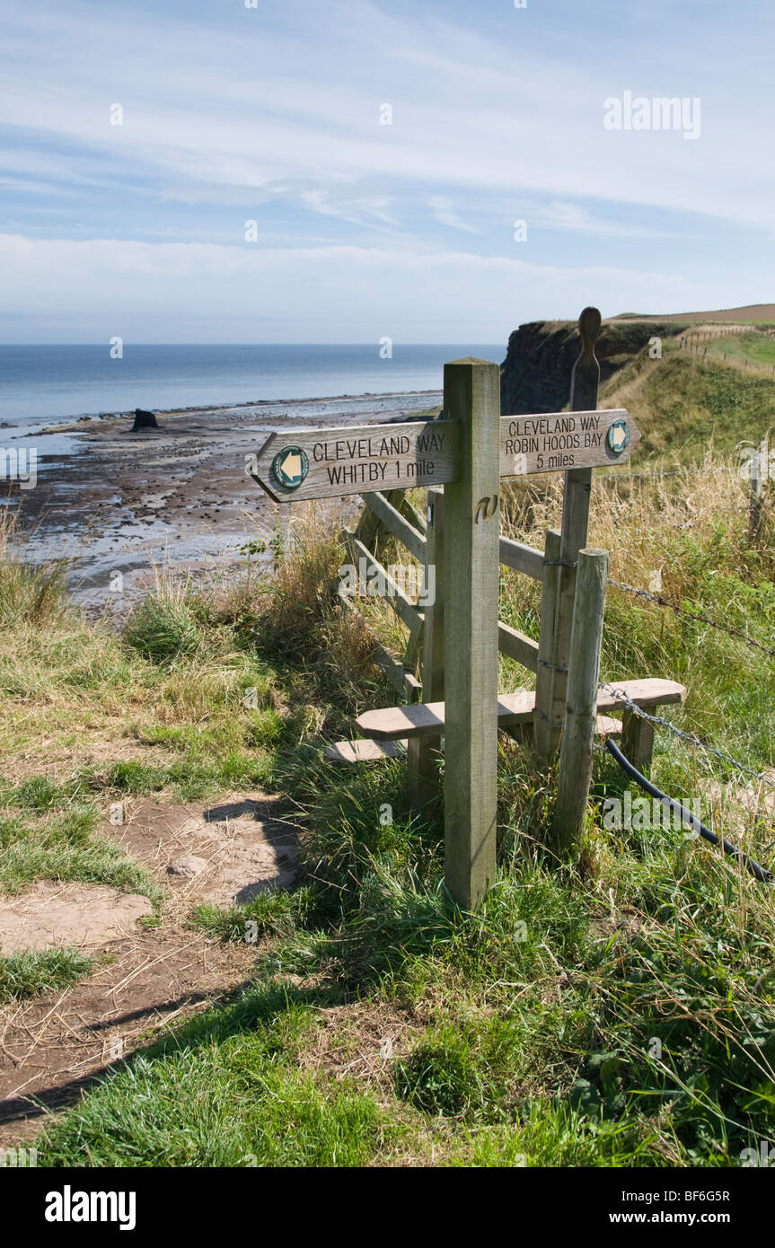 Signpost for walkers and hikers, Cleveland Way, Saltwick Bay, near Whitby, North Yorkshire, UK Stock Photo
