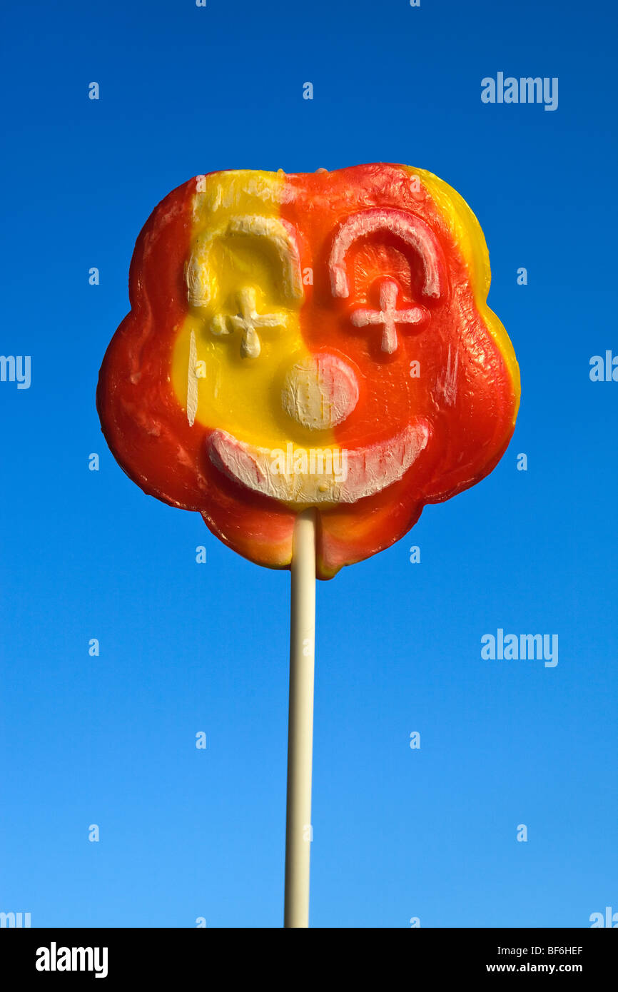 Seaside Lollypop with Smily Face Stock Photo