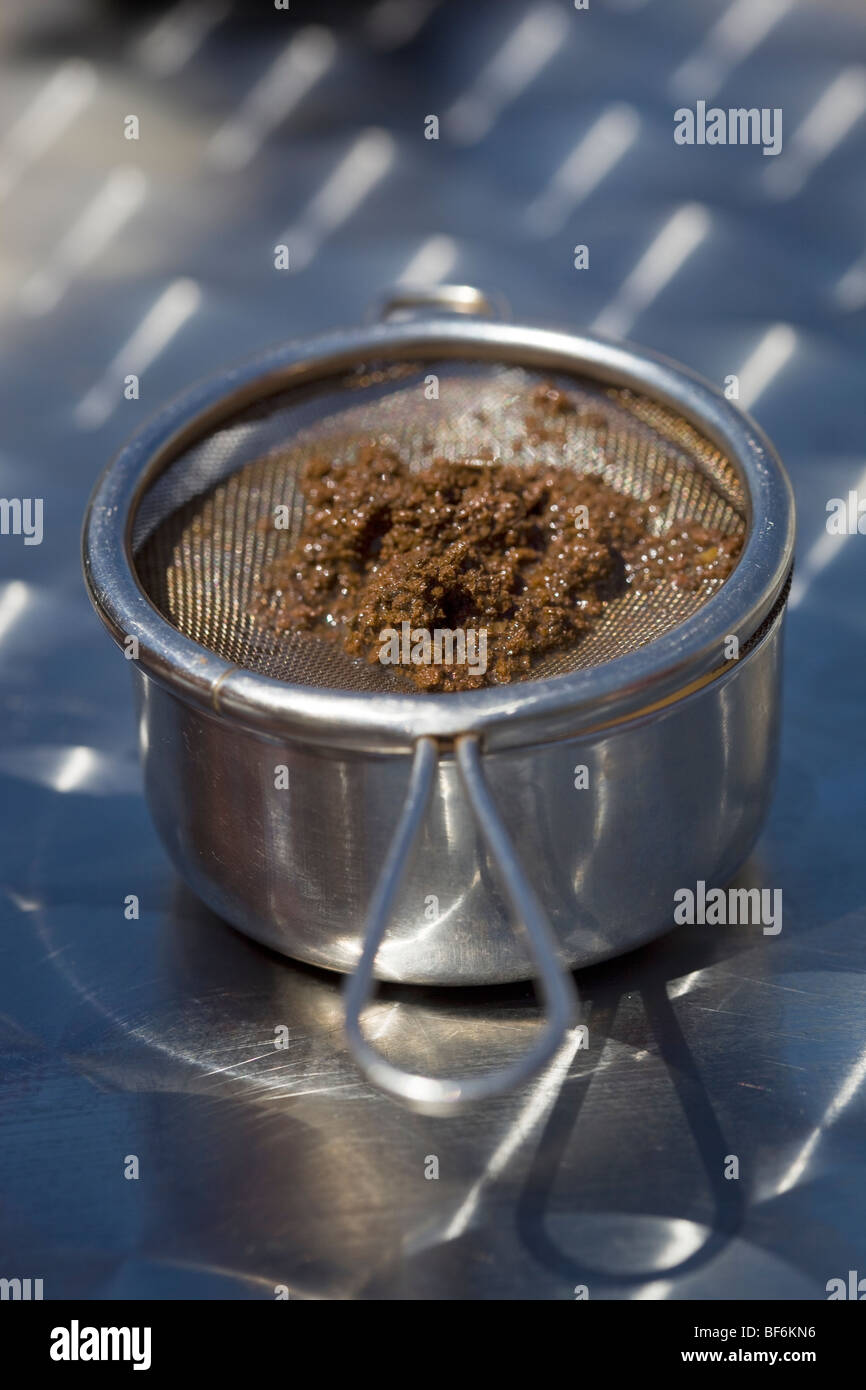 Tea Leaves and Strainer Stock Photo Alamy