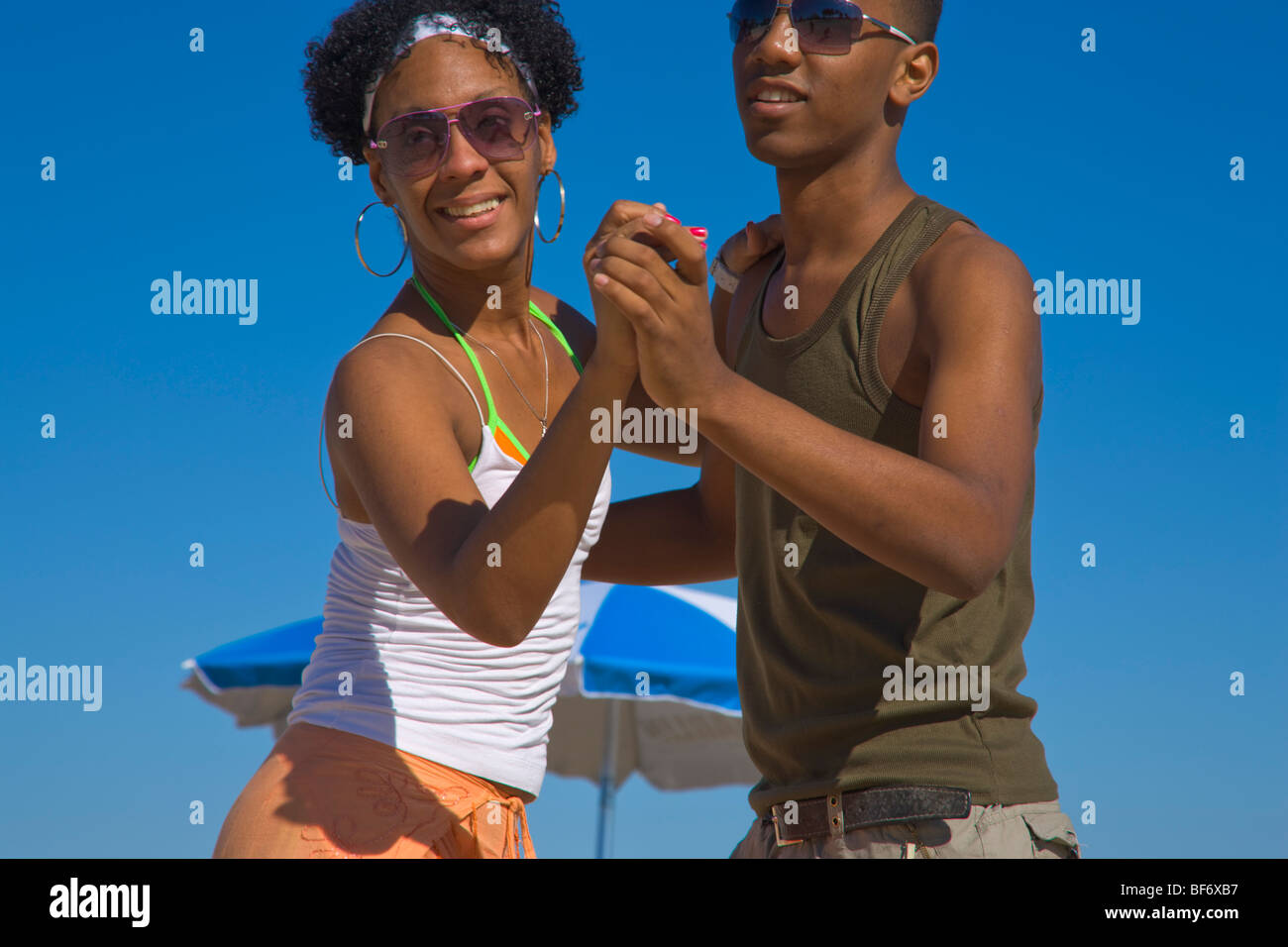 Young couple dancing salsa at beach, Playas del Este, Havana, Ciudad de La Habana, Cuba, West Indies Stock Photo