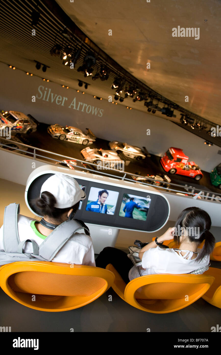 Teenagers at Mercedes-Benz-Museum in Stuttgart, Baden-Wurttemberg, Germany Stock Photo